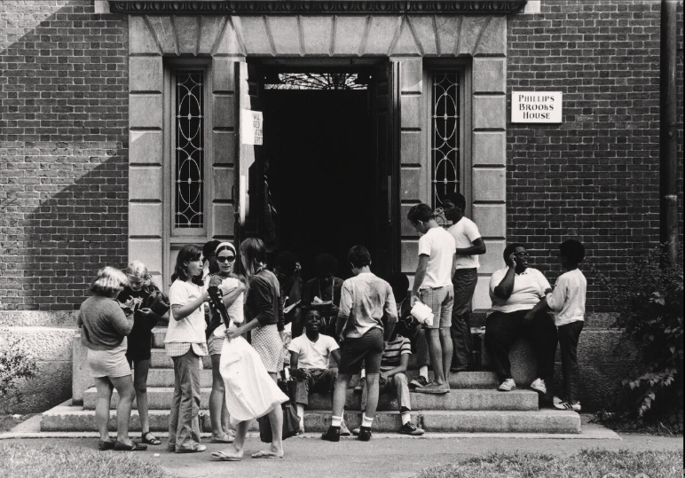 Phillips Brooks House in the 1960s with people on the steps